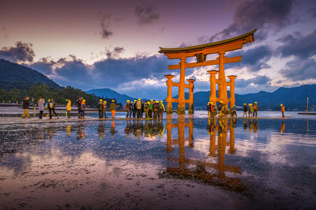 Miyajima, Japan - November26: The famous torii gate of the Itsukushima Shrine on Miyajima. Photographed at sunset.のeditorial素材