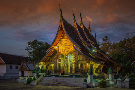 Wat Xieng thong temple at twilight time in Luang Pra bang, Laos.の写真素材