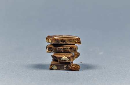 pieces of chocolate with nuts.の写真素材