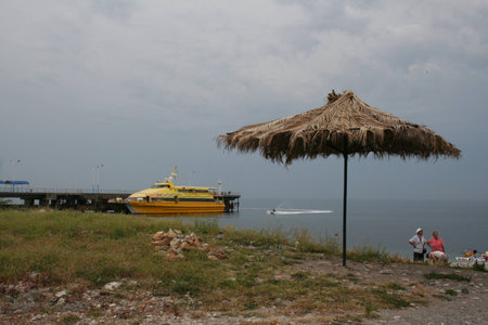 Yellow catamaran at the mooring in Pitsunda Abkhazia.の写真素材