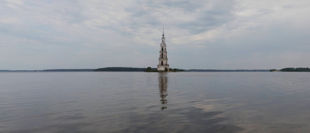 Volga near the city of Kalyazin Russia. A belltower of the St. Nicholas Cathedral flooded with a reservoir in 1940.の写真素材