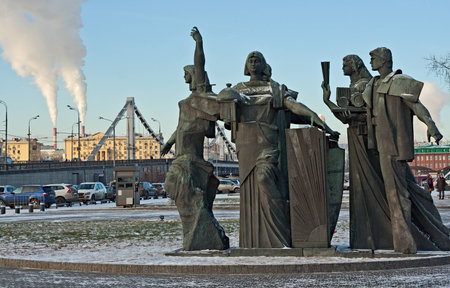 The sculptural group devoted to work and creativity costs at an entrance to park Muzeon with meeting of sculptures of socialist realism.の写真素材