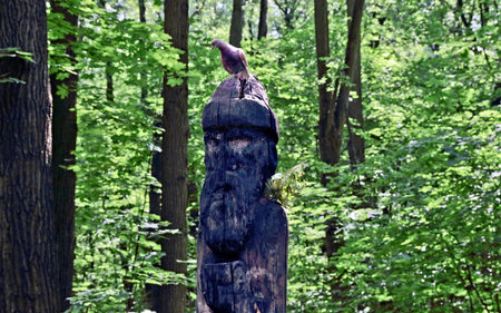 Velez's figure - the heavenly shepherd, what grazes clouds and creates them at own will. Health and destiny of terrestrial cattle in his attentive hands. He is the main owner of the wood. Russia, Moscow, Tsaritsyno park.の写真素材