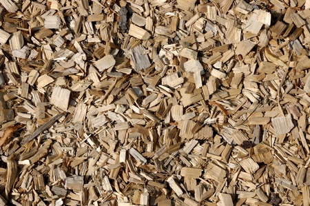 Light brown wood pellets as a playground fall protectionの写真素材