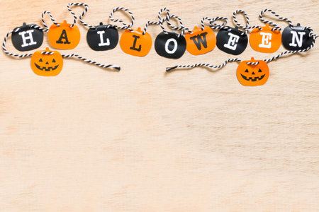 Halloween flags , black and orange flags on wooden background
