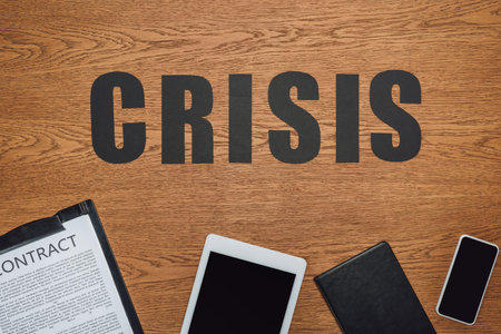 top view word crisis smartphone