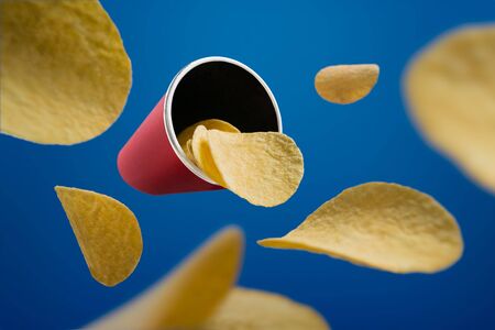 Creative Concept Art Falling Crispy Potato Chipsの写真素材