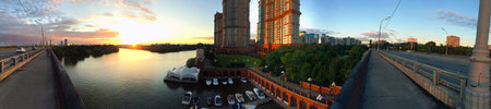 Panorama over the city with a sunset