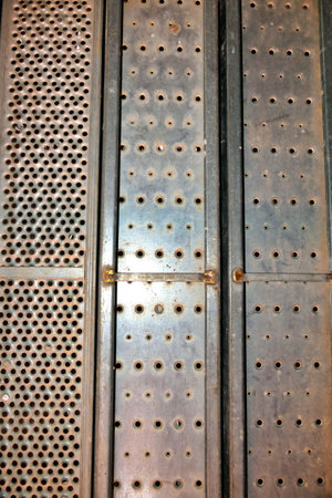 Close up of cement encrusted metal scaffolding planksの写真素材