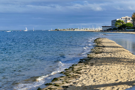Sand spit formed on the shoreline of Arcachon, France as the tide comes inの写真素材