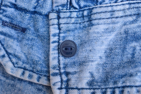Folded Blue Denim Shirt Fabric Texture Close Up Background