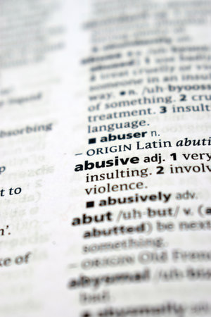 Close Up Of English Dictionary Page With Word -   Abusive   Imageの写真素材