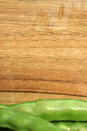 Group Of Fresh Hyacinth Bean or Same Ki Phalli On Wooden Table Close Up With Background Blur  Imageの写真素材
