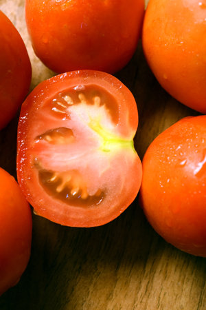 Fresh Group Of Red Tomatoes On Wooden Table Imageの写真素材