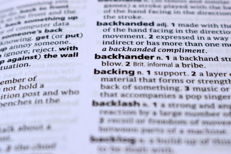 Backhander  English Definition Dictionary Page Of Printed Word -  Close Up Imageの写真素材