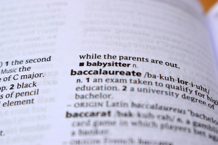 English Definition Dictionary Page Of Printed Word - Babysitter   Close Up Imageの写真素材