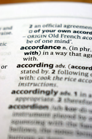 Close Up Of English Dictionary Page With Definition Word -    Accordance   Imageの写真素材