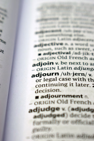 Close Up Of English Dictionary Page With Definition Word -  Adjourn     Image