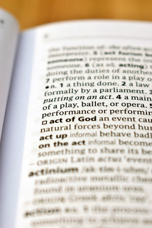 Close Up Of English Dictionary Page With Definition Word - Act Of God     Imageの写真素材