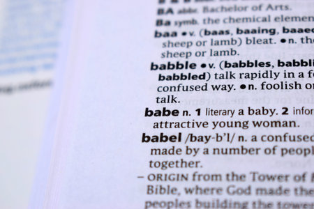 Close Up Of English Dictionary Page With Definition Word - Babe   Image