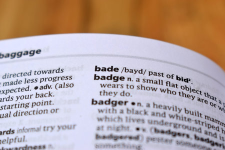 Close Up Of English Dictionary Page With Definition Word -  Bade   Image
