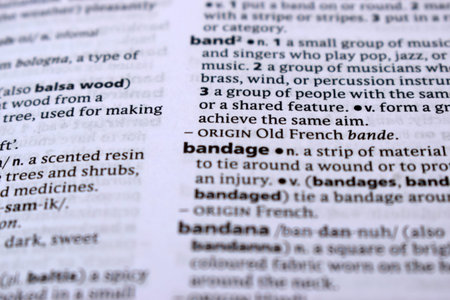 Close Up Of English Dictionary Page With Definition Word -  Bandage   Image