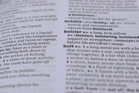 English Definition Dictionary Page Of Printed Word -  Bolster  Close Up Image