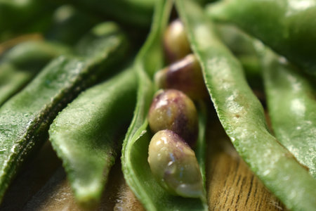 Group Of Fresh Hyacinth Bean or Same Ki Phalli On Wooden Table Close Up With Background Blur  Image