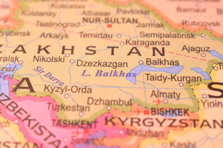 Dzezkazgan With Neighboring Countries And Cities On World Map- Political Map Background Blur Image