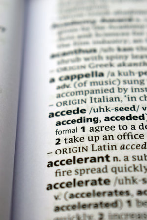 Close Up Of English Dictionary Page With Word -   Accede   Image