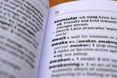 Close Up Of English Dictionary Page With Definition Word -    -Avuncular  Image