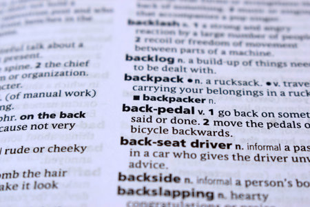 English Definition Dictionary Page Of Printed Word - Back-pedal   Close Up Image