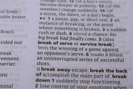 English Definition Dictionary Page Close Up Of Printed Word Of -Break of serveの写真素材