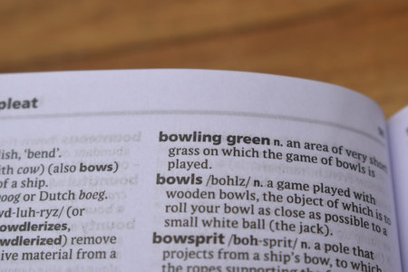 Close Up Of English Dictionary Page With Word - Bowling green