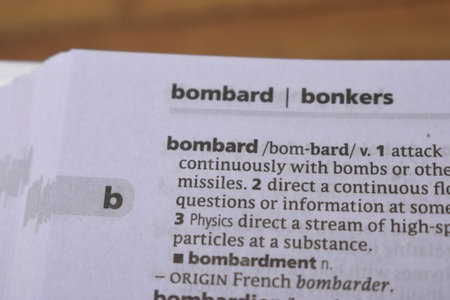 Close Up Of English Dictionary Page With Word - Bombard