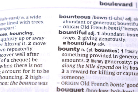 English Definition Dictionary Page Close Up Of Printed Word Of -Bounty