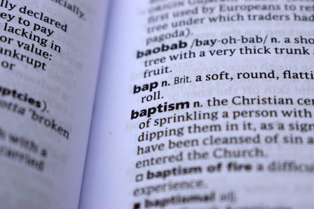 Close Up Of English Dictionary Page With Word - baptismの写真素材