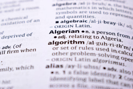 English Definition Dictionary Page Close Up Of Printed Word Of -Algerian