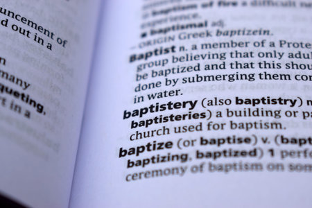 Close Up Of English Dictionary Page With Word - baptistery