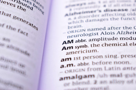 English Definition Dictionary Page Close Up Of Printed Word Of -Am