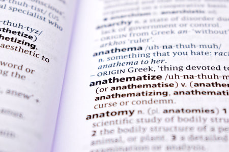 English Definition Dictionary Page Close Up Of Printed Word Of -anathematize