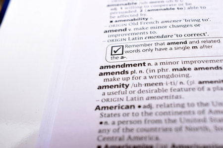English Definition Dictionary Page Close Up Of Printed Word Of -amendsの写真素材