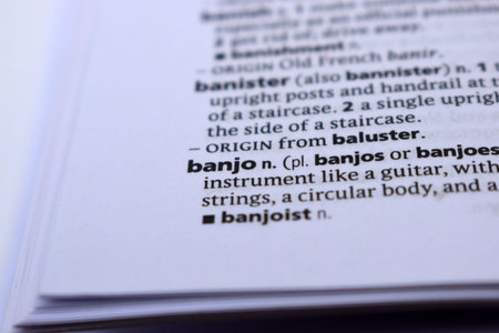 Close Up Of English Dictionary Page With Word - banjo