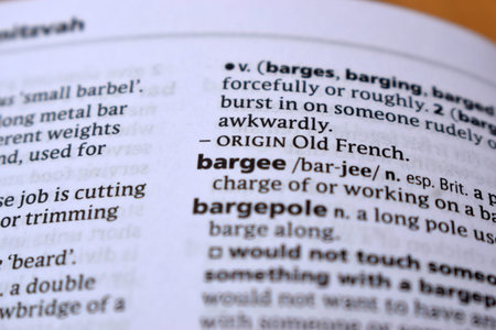 Close Up Of English Dictionary Page With Word - bargee