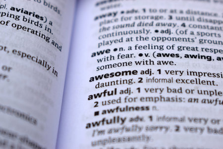 Close Up Of English Dictionary Page With Word - awesomeの写真素材