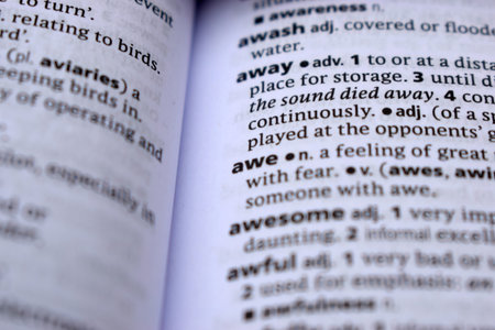 English Definition Dictionary Page Close Up Of Printed Word Of -aweの写真素材