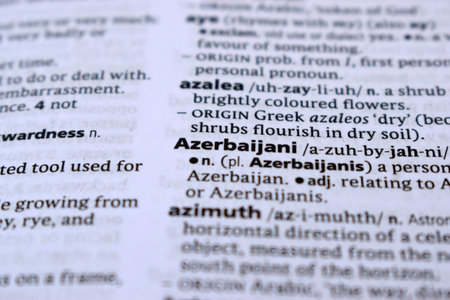 Close Up Of English Dictionary Page With Word - azarbaijani