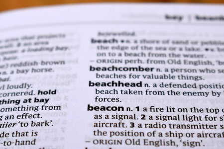 English Definition Dictionary Page Close Up Of Printed Word Of -beacon