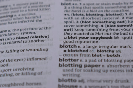 Close Up Of English Dictionary Page With Word - blotchの写真素材