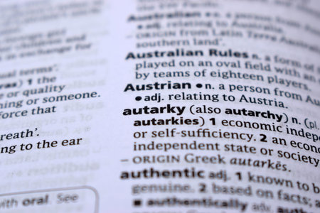 English Definition Dictionary Page Close Up Of Printed Word Of -autarky